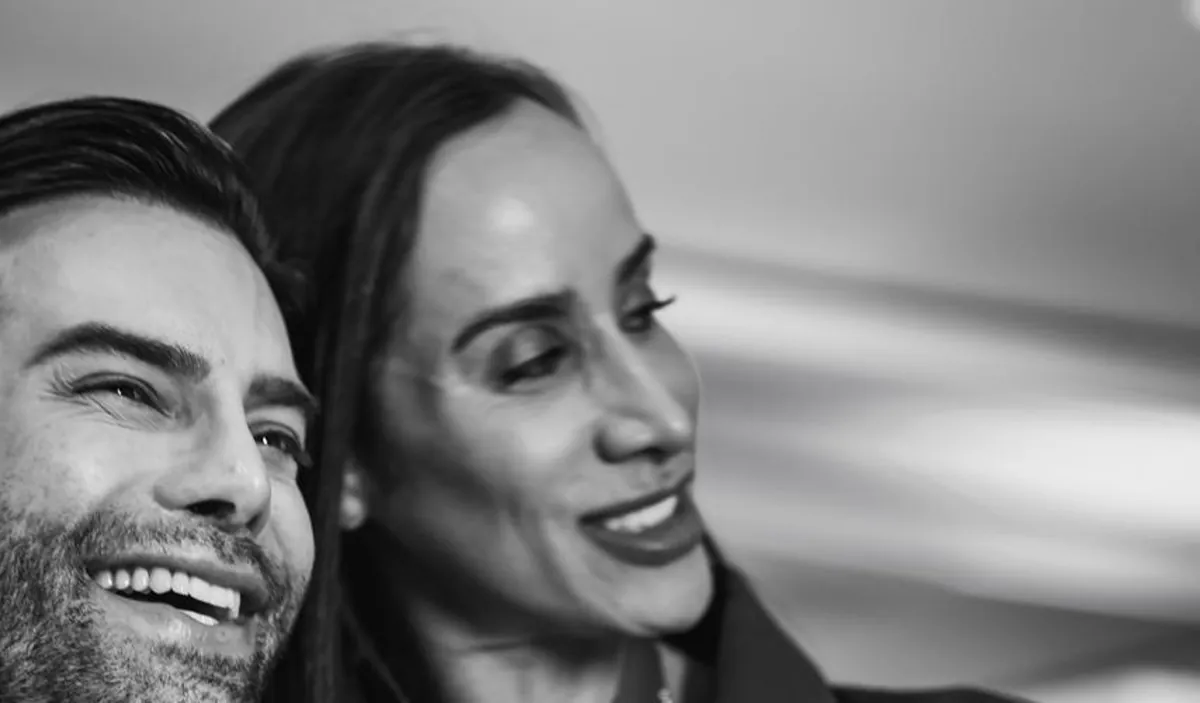 Dr. Matheus Arantes com uma participante durante um encontro presencial